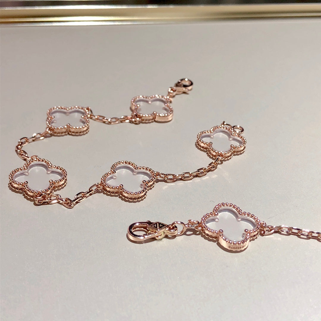 New CLOVER 5 MOTIF ROCK CRYSTAL BRACELET