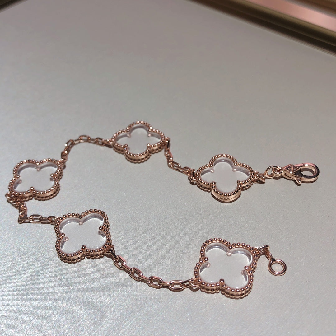 New CLOVER 5 MOTIF ROCK CRYSTAL BRACELET