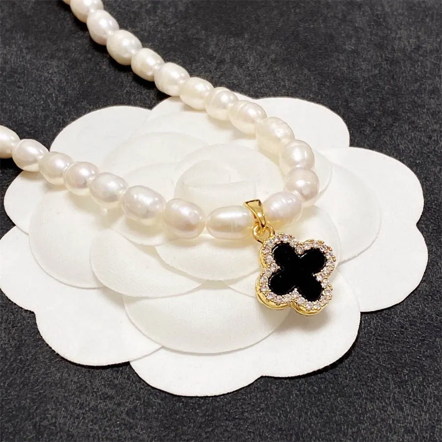 Chanel pearl four-leaf clover black and white double wear necklace