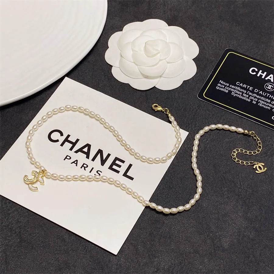 Chanel millet pearl patchwork letter necklace