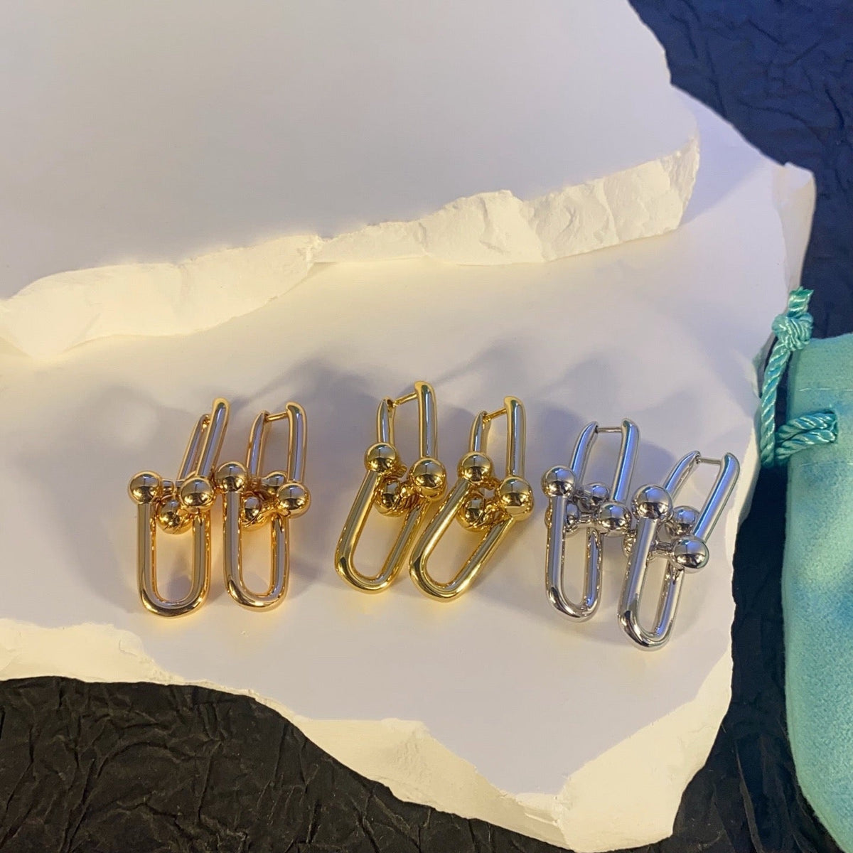 TF U-shaped earrings