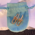 TF U-shaped earrings