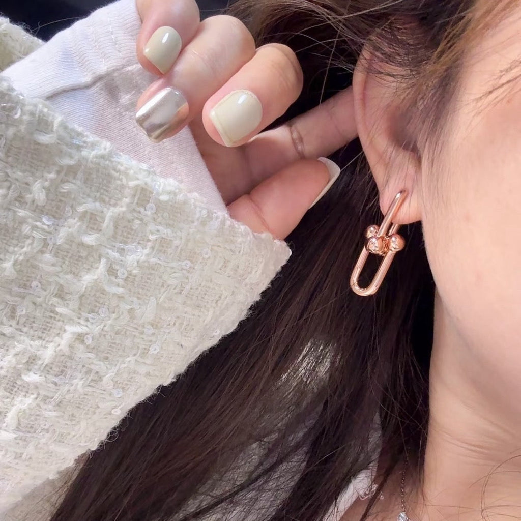 TF U-shaped earrings