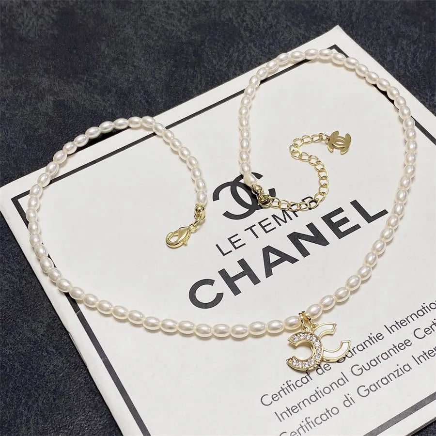 Chanel millet pearl patchwork letter necklace