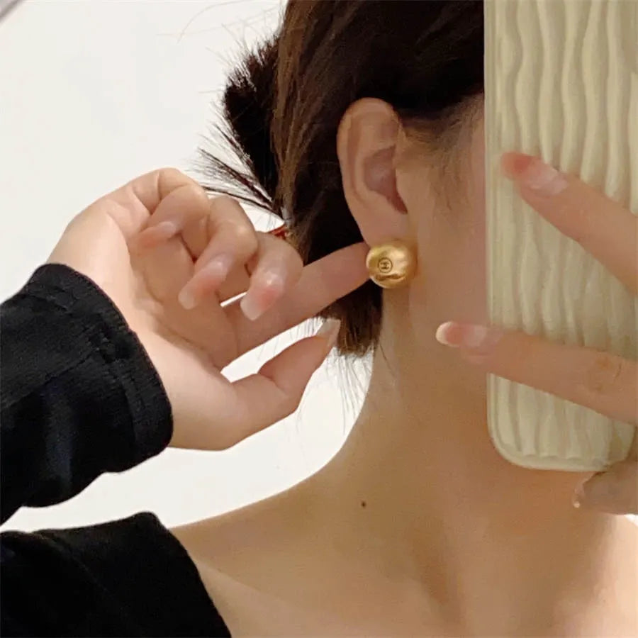 Chanel brushed gold stud earrings