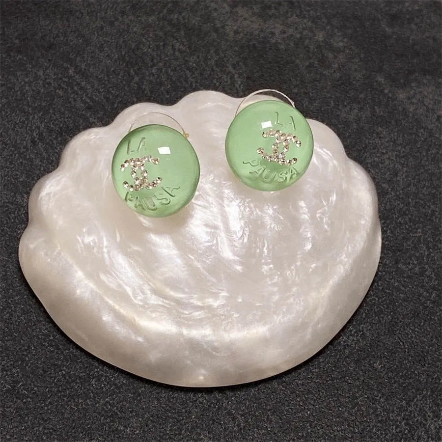 Chanel light green crystal stud earrings with diamonds
