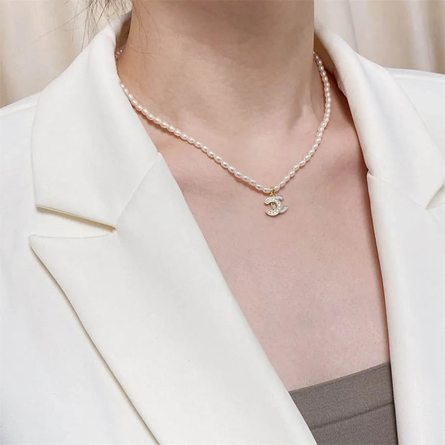 Chanel millet pearl patchwork letter necklace