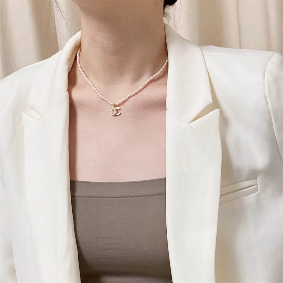 Chanel millet pearl patchwork letter necklace