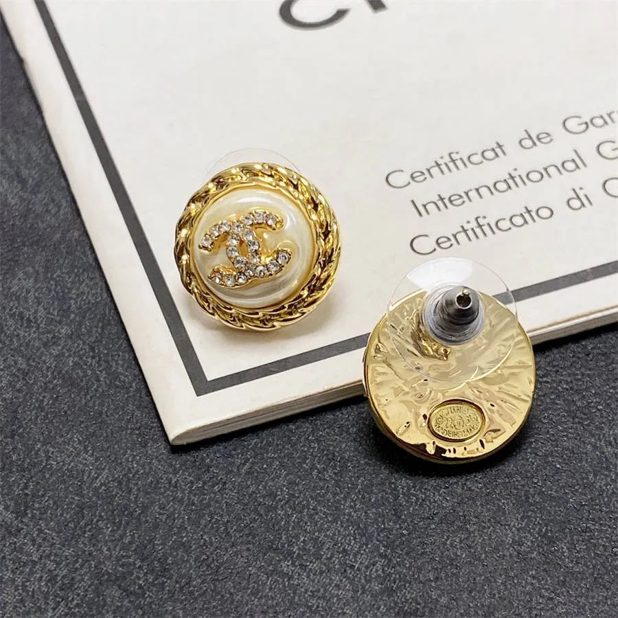 Chanel medium antique gold double C stud earrings with diamonds