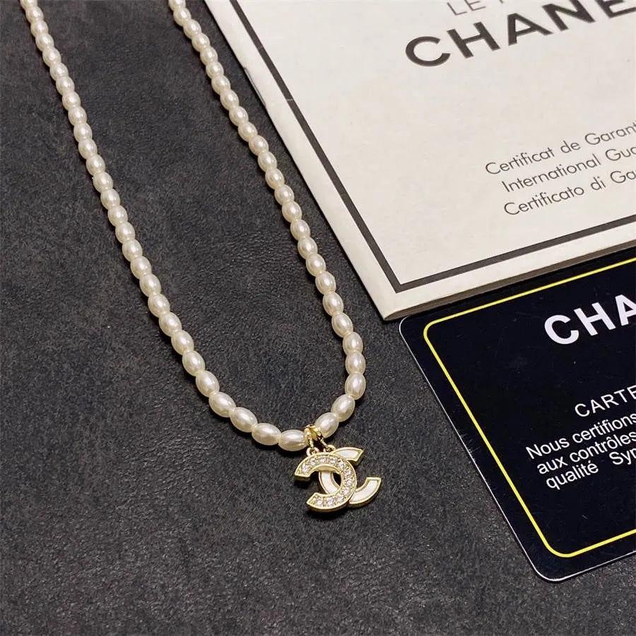 Chanel millet pearl patchwork letter necklace