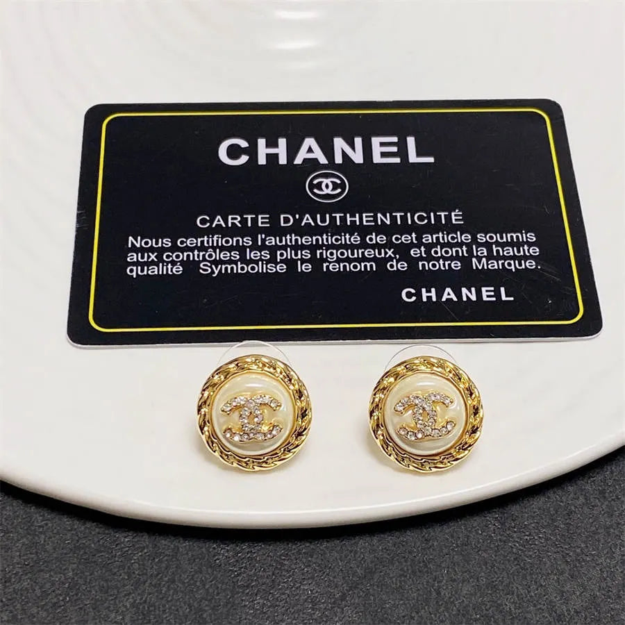 Chanel medium antique gold double C stud earrings with diamonds