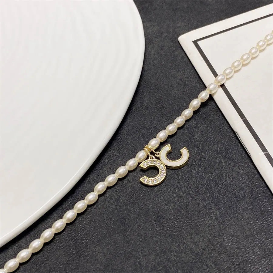 Chanel millet pearl patchwork letter necklace