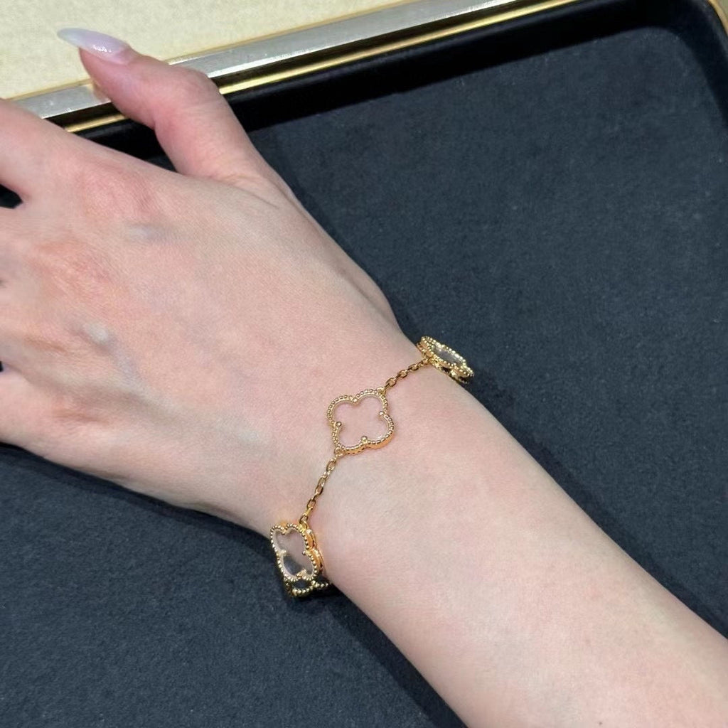 New CLOVER 5 MOTIF ROCK CRYSTAL BRACELET