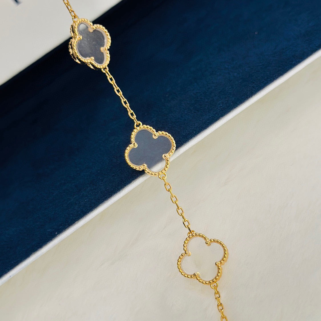 New CLOVER 5 MOTIF ROCK CRYSTAL BRACELET