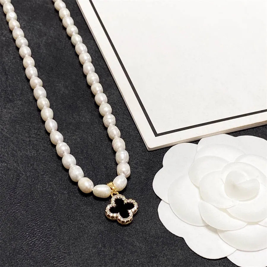 Chanel pearl four-leaf clover black and white double wear necklace