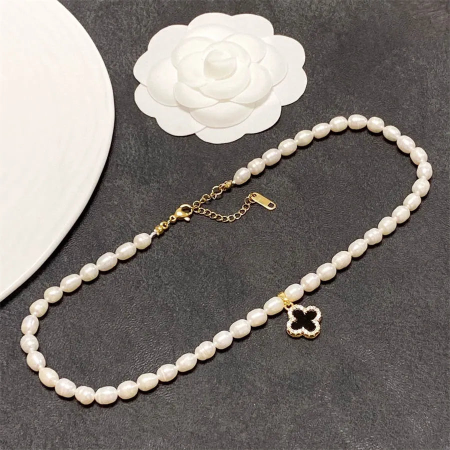 Chanel pearl four-leaf clover black and white double wear necklace