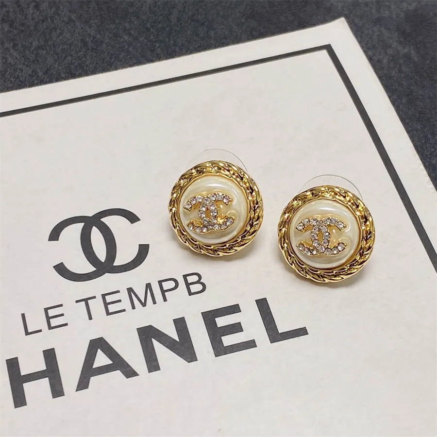 Chanel medium antique gold double C stud earrings with diamonds