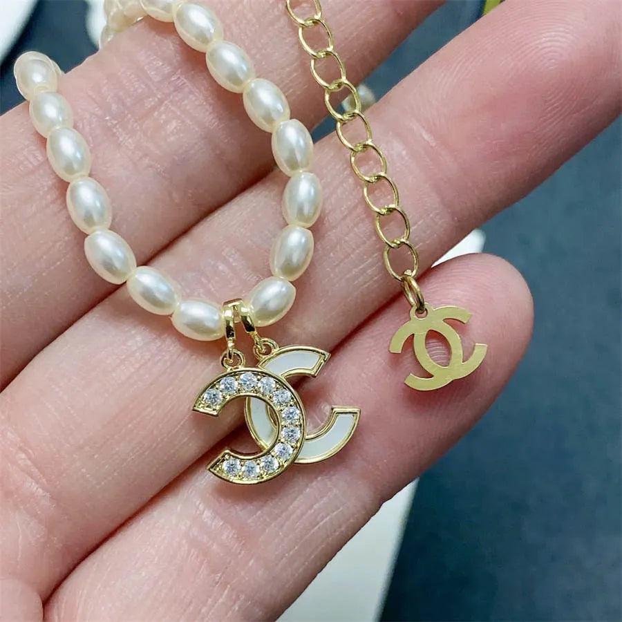 Chanel millet pearl patchwork letter necklace