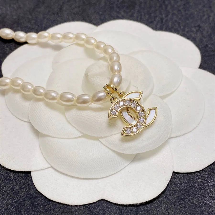 Chanel millet pearl patchwork letter necklace